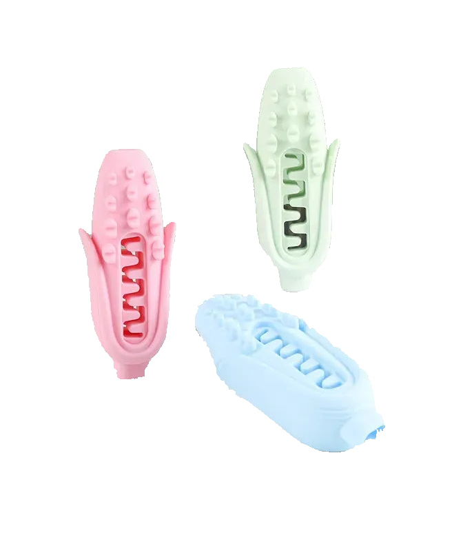Textured corn cob dog dental chew toys in pink, green, and blue with teeth cleaning ridges and molar nubs