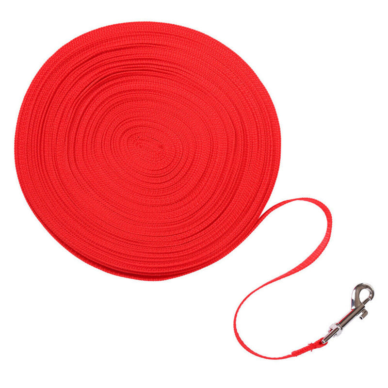 Red long nylon dog training leash coiled roll with metal 360-degree swivel hook for outdoor recall and obedience
