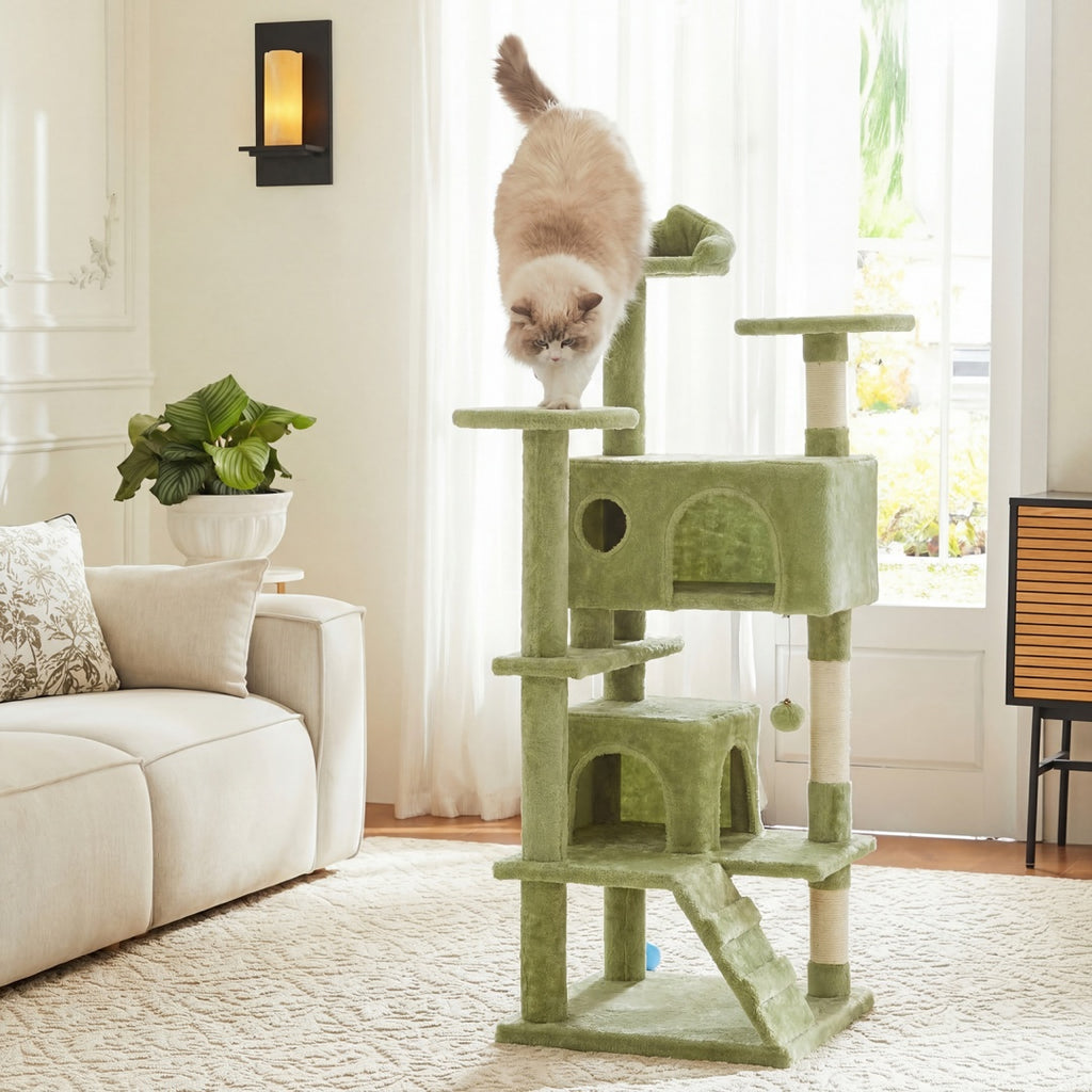 Modern green multi-level cat tree placed in a cozy living room setting with cat climbing down
